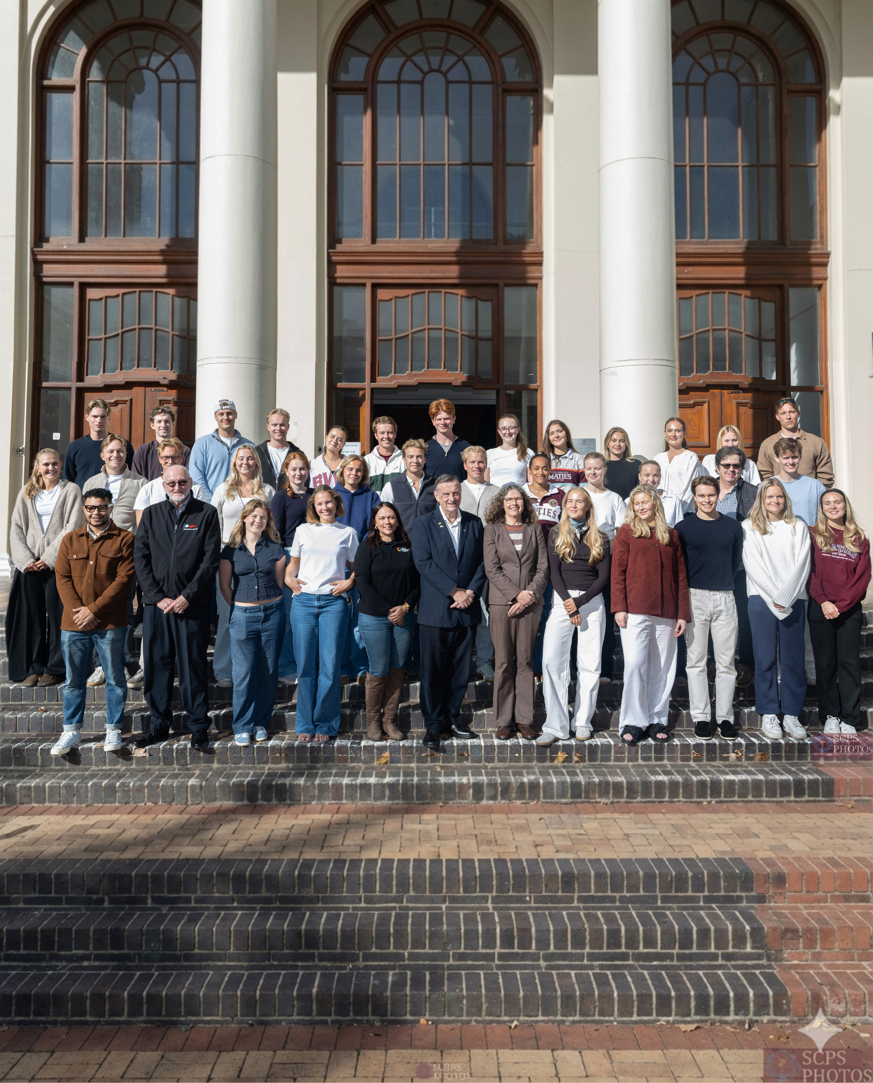 International students gathered on the steps of Stellenbosch University