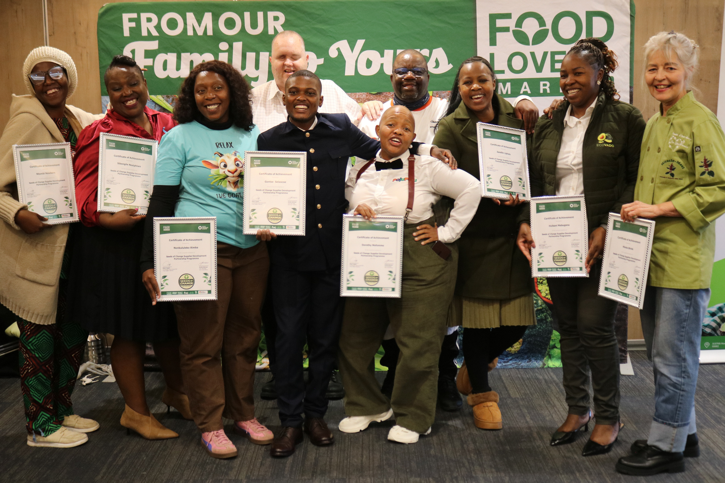 Supplier Development Programme graduates holding their certificates